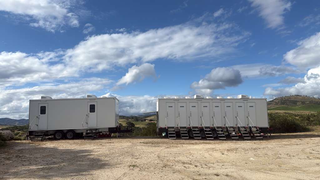 Texas luxury restroom trailer rental — The Lavatory Texas mobile bathroom trailer at outdoor event venue