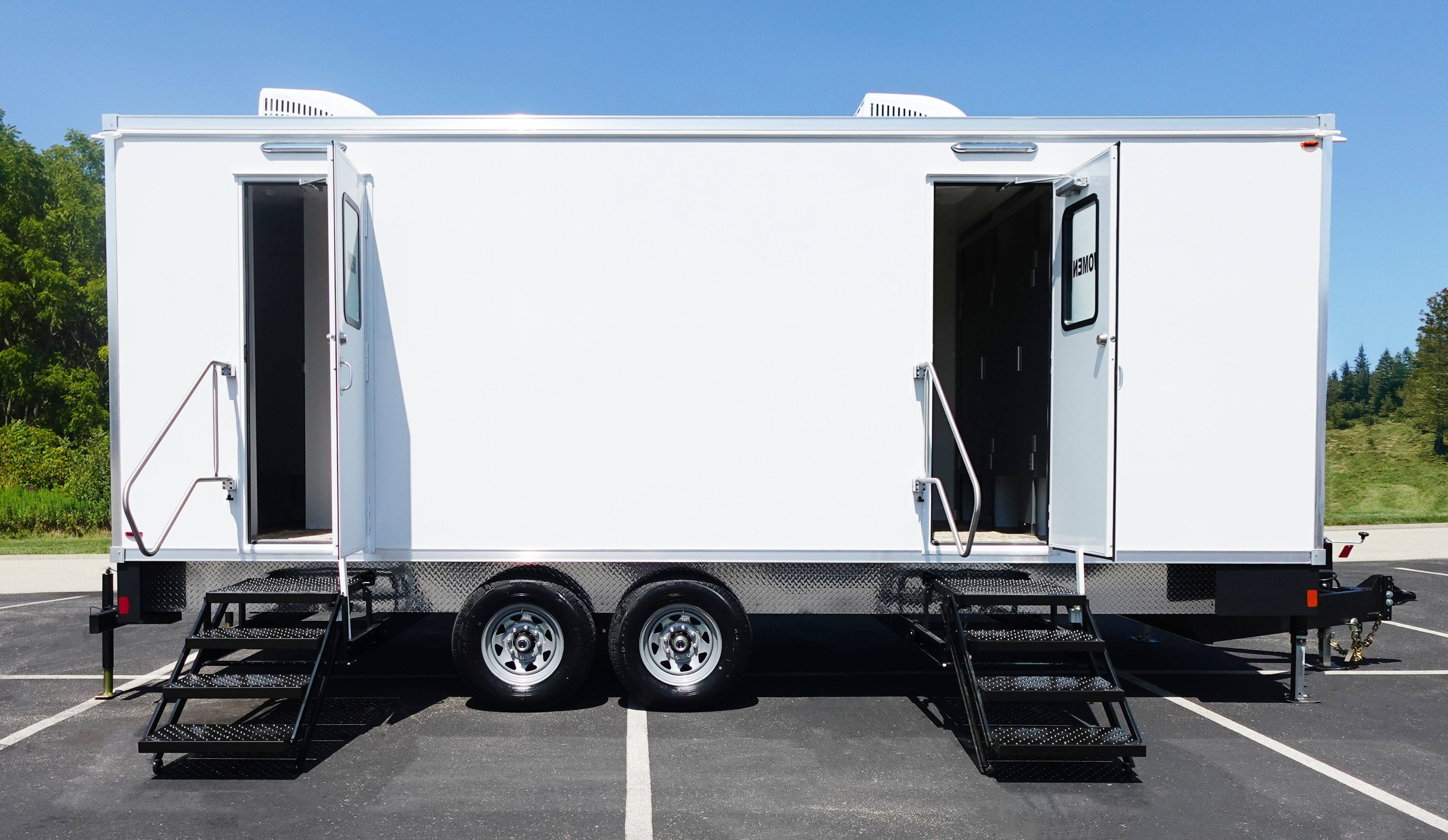9 station luxury restroom trailer rental Texas. Large event bathroom trailer for 400 to 900 guests